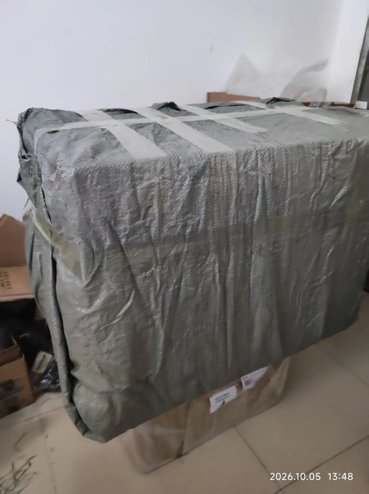 Automotive parts shipment wrapped for international dispatch to Iraq